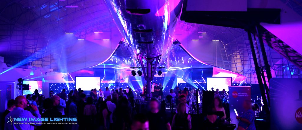 Stage and lighting under the Concorde at the Concorde Conference Centre with video projection