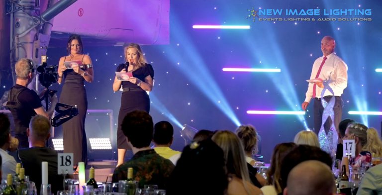 Awards presentation on a runway-themed stage at the Concorde Conference Centre at Runway Visitor Park